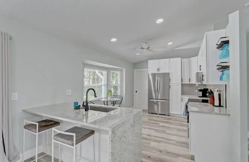 Royal Palm Beach House | Private Home with Oasis Backyard w/Pool, BBQ, King Beds
