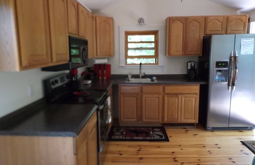 Meredith Cottage | Private island setting with spectacular sunset views and awesome new bunkhouse