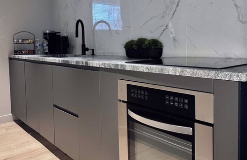 East Allegheny Apartment | Private Parking Walk Everywhere Style King bed