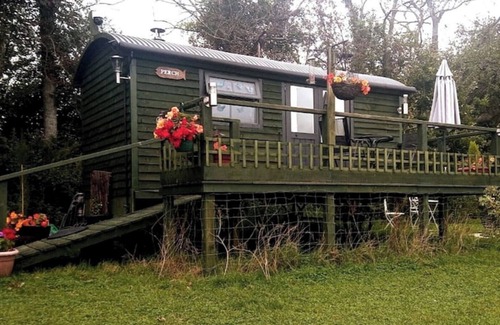Hadlow Down House | Private, quiet en-suite hut, glorious views to South Downs, wild swimming.
