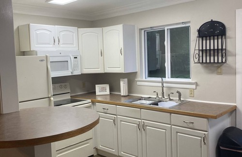 Fentress House | Private single family home with a natural wooded setting providing much privacy.