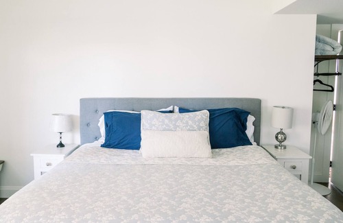 Goodville Other | Private suite with kitchenette, bedroom, bathroom and patio.