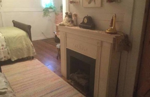 Pembine Bed & Breakfast | Private Victorian Cottage-themed room with shared baths/ kitchenette
