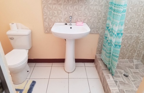 Canefield House | Property is located in a middleclass community, and fifteen minutes from Roseau.
