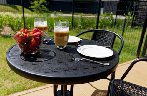 Fabryczna Apartment | Przytulny apartament z ogródkiem w doskonałej lokalizacji Fair Rentals