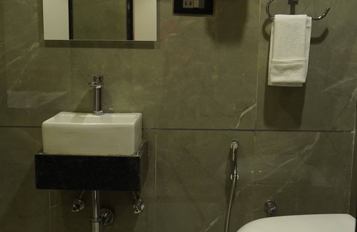 Surat Hotel | Purple Beds by VITS Dwarkesh, Surat