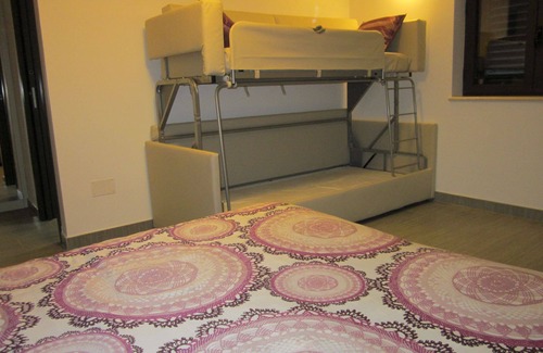 Campolattaro Hotel | Quadruple Room Delux - Bedroom with lake view
