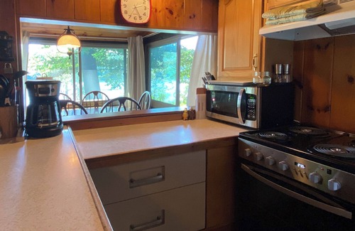 Oxford Cottage | Quaint and cozy Maine cottage on quiet Hogan Pond with large sandy beach!
