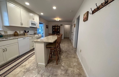 Elm House | Quaint Cape Cod attached home nestled atop a hill near Speedwell Forge Lake