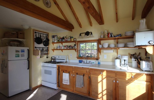 Mid-Coast and Islands Cottage | Quaint cottage intimately set on the rocky coast overlooking Casco Bay