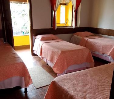 Serra Apartment | Quarto com varanda em casa próxima a área hospitalar em BH