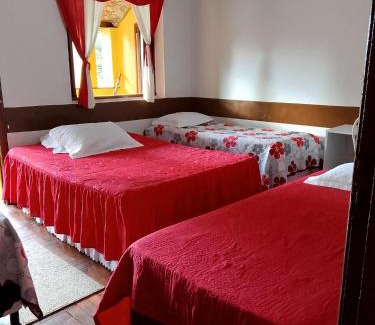 Serra Apartment | Quarto com varanda em casa próxima a área hospitalar em BH