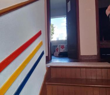 Serra Apartment | Quarto com varanda em casa próxima a área hospitalar em BH