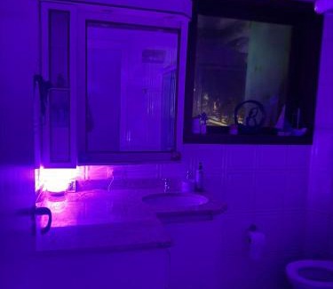 Tombo House | Quarto lateral da beira mar - tombo - guarujá