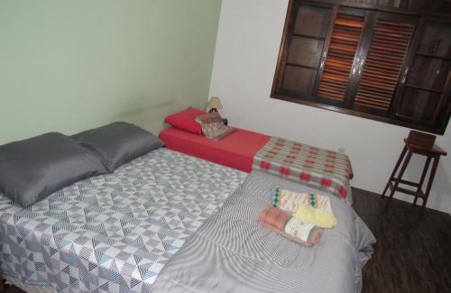 Vila Gardenia House | Quarto Suíte Pitanga