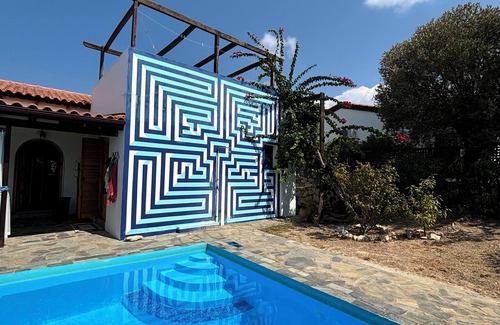 Roumeli Villa | Quiet 2 bedroom air-conditioned villa with private pool, patio and roof terrace