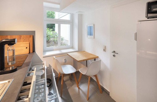 Zentrum-Nordwest Apartment | Quiet backyard oasis for 1 to 9 people | WLAN | SmartTV | washing machine | dryer