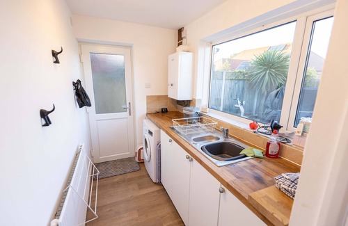 Herne Bay House | Quirky bungalow on coastal walk with distant sea views. Fully secure garden.