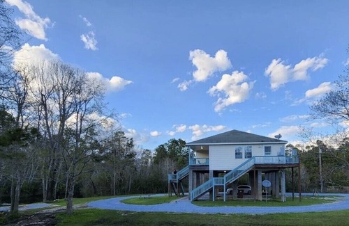 Pass Christian House | Raised 3 bed 2 bath house with canal access to Wolf River