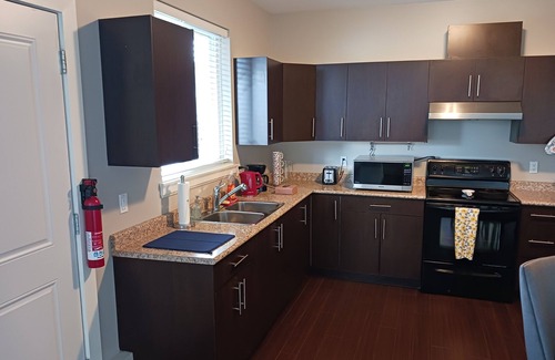 Surrey House | Recently finished clean and bright Family Suite
