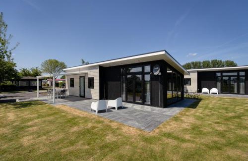 Lathum Ski Chalet | Recreatiepark Jachthaven De Veerstal Lathum - Luxe Chalet