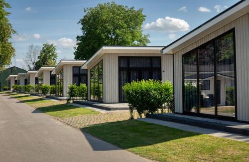 Lathum Ski Chalet | Recreatiepark Jachthaven De Veerstal Lathum - Luxe Chalet