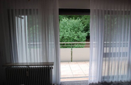 Meersburg Apartment | Recreation at the edge of the forest, Modern apartment with swimming pool