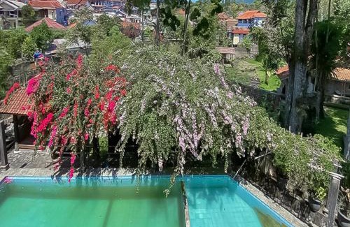 Sukaresmi Hotel | RedDoorz near Taman Bunga Nusantara