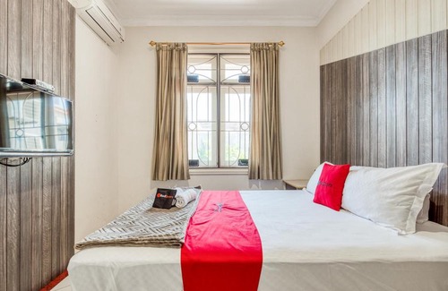 Surabaya House | RedDoorz near UNTAG Surabaya