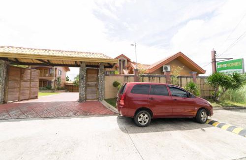 Tarlac Hotel | RedDoorz Plus @ Starhomes Olivianville