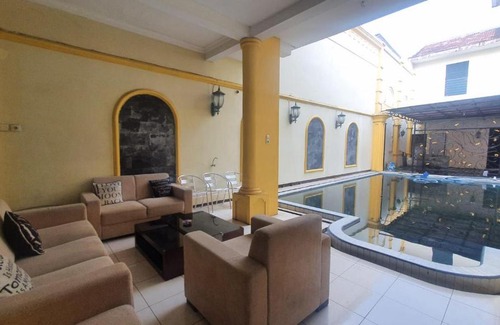 Jember Hotel | RedDoorz Syariah At Demasto Homestay Jember