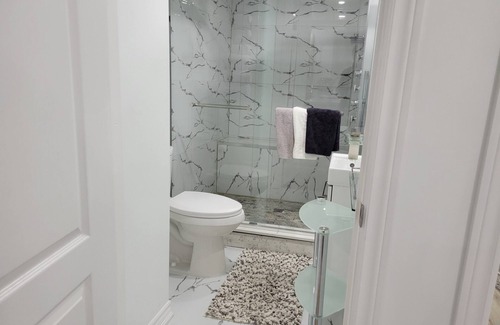 Ajax House | RedDore - Exquisite 2 Bedroom Basement Suite