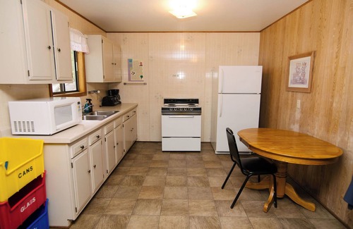 Richmond Cabin | Reel 'Em Inn, a spacious 4BR cabin with queens in every room at Riverside Resort