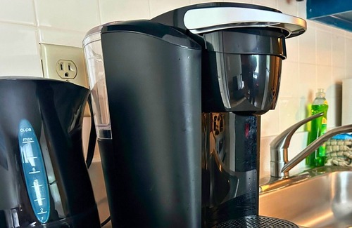 Wells Condo | Refreshing pool view condo at Nautical Mile resort Pool Tennis Courts