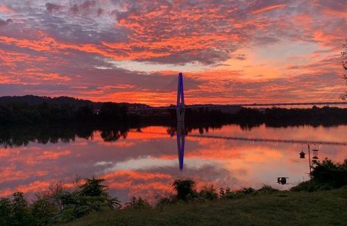 Russell House | Relax at Rivertime with a Bridge and River view, plus a HotTub