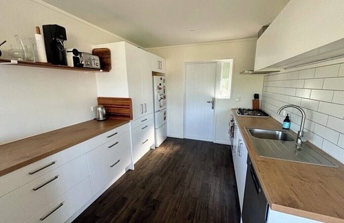 Rototai House | Relax at Rotoiti - Gisborne Point. Family-sized bach - pet friendly!