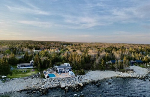 Hunts Point Cottage | Relaxing Oceanfront Retreat . Hot tub -sauna-pool-clear domes-private