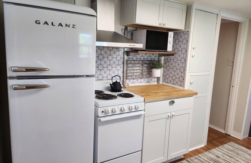 Warsaw Cottage | Relaxing Riverfront, Private Dock, & Hot Tub