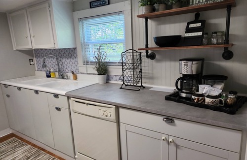Warsaw Cottage | Relaxing Riverfront, Private Dock, & Hot Tub