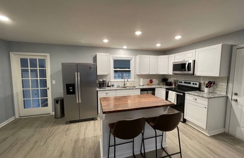 Manchester House | Remodeled Cottage with Sunroom