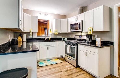 Garden City House | Remodeled home with pool/guest house, new pool, lovely yard & bright interior