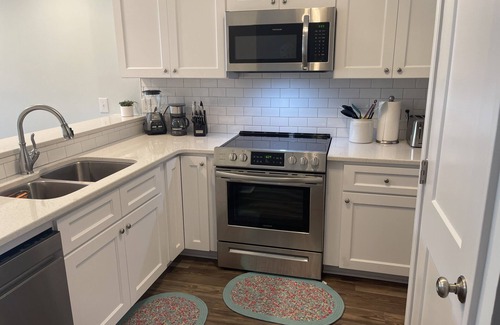 Morehead City Condo | Renovated 2021!Family Fun 2br/2b Vacation Rental! Pools, waterslide, mini golf!