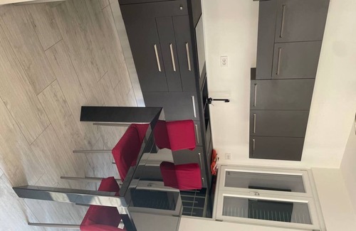 Sirmione Apartment | Renovated apartment with parking and small condominium beach