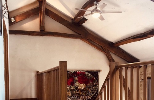 Auriat House | Renovated barn, Master bedroom, bedroom with 2 singles and mezzanine double bed