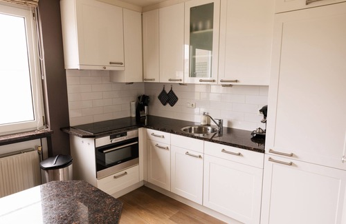 Makkum House | Renovated holiday home with its own jetty, sauna, internet