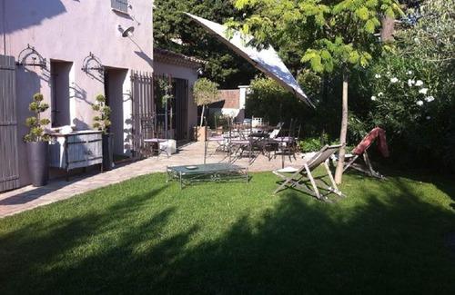 Nord House | Renovated old house with garden and pond.