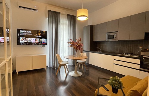 Quartieri Settecenteschi Apartment | Residence Petrone a luxury apartment in the city center.