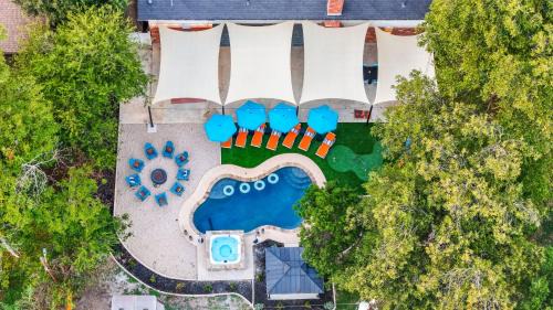 Medical Center District House | Resort Style Backyard Pool Putt Putt Hot Tub