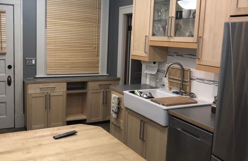 Downtown House | Restored 1906 3-Bedroom Townhouse Overlooking the Mississippi River unit #1.