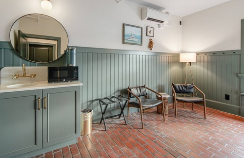 Poulsbo House | Restored 9-room boutique hotel in historic downtown with city views & parking